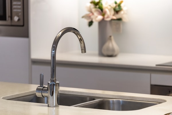 Stainless steel faucet representing quality plumbing maintenance