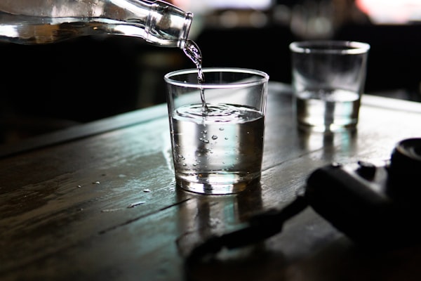 Clear water being poured into a glass